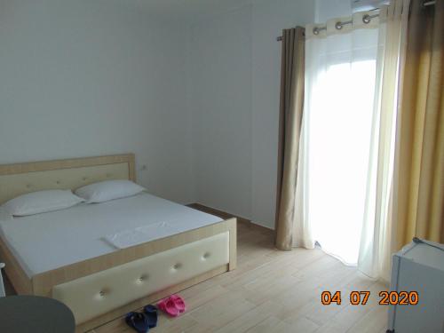 Ein Bett oder Betten in einem Zimmer der Unterkunft South Coast Villa