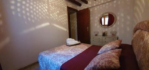 Säng eller sängar i ett rum på Casa Rural SIGLO XX