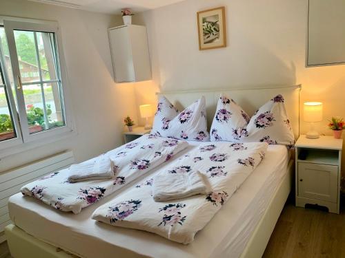 Postel nebo postele na pokoji v ubytování Amazing Apartment EIGER Grindelwald