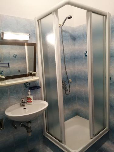 a bathroom with a shower and a sink at Apartment Marija in Krk