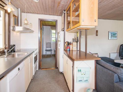 una cucina con lavandino e piano di lavoro di 4 person holiday home in Haderslev a Haderslev
