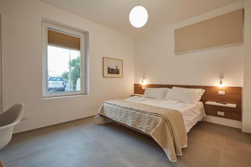 Ένα ή περισσότερα κρεβάτια σε δωμάτιο στο B&B Torreforte