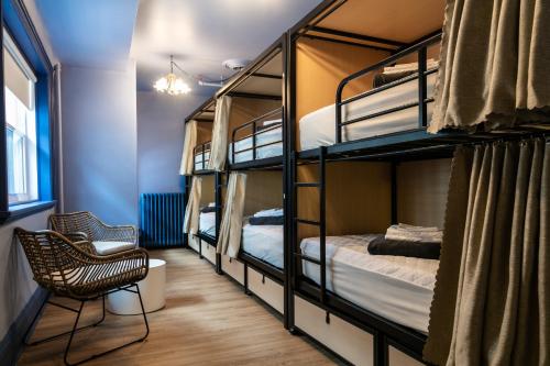 Postel nebo postele na pokoji v ubytování Auberge Jeunesse QBEDS Hostel