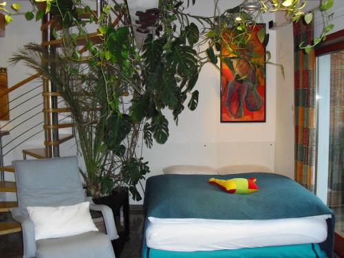 Ein Bett oder Betten in einem Zimmer der Unterkunft Studio A Am Burgberg