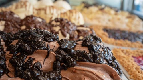 a display of chocolate covered desserts on a table at Hotel Colonial in Colonia Sant Jordi