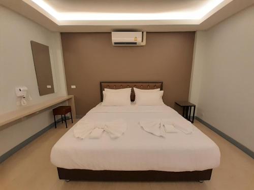 Postel nebo postele na pokoji v ubytování Zleep D Hotel