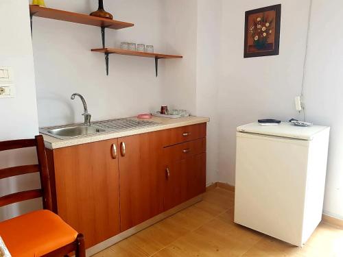 Kuchyň nebo kuchyňský kout v ubytování Aira Apartment