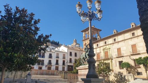 a street light in front of a building at Coso Viejo in Antequera