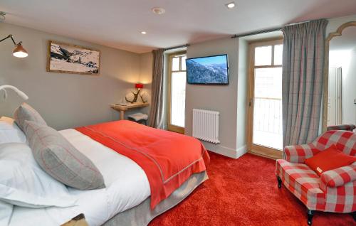 Ένα ή περισσότερα κρεβάτια σε δωμάτιο στο Maison de Famille Les 5 Frères