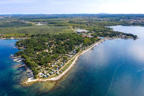 an aerial view of an island in the water at Camping Ulika Mobile Homes - Naturist in Poreč