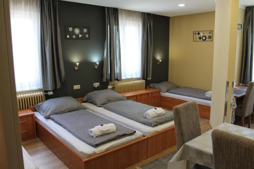Postel nebo postele na pokoji v ubytování Kirschbaum Apartment