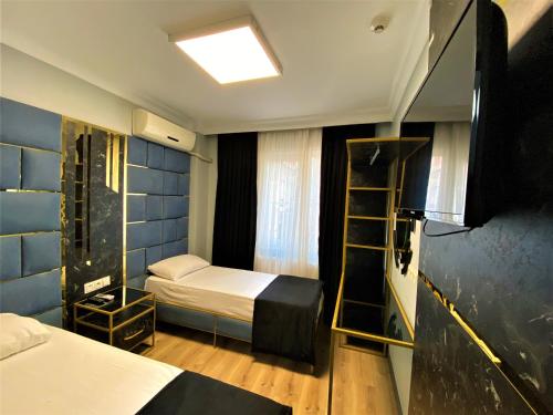 Postel nebo postele na pokoji v ubytování Orange Airport Hotel