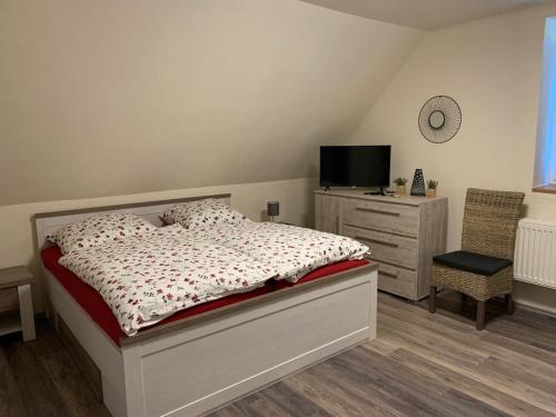 מיטה או מיטות בחדר ב-Ferienhaus Casa Markus Kalkar