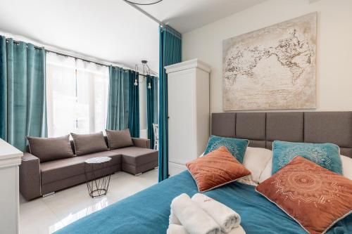 מיטה או מיטות בחדר ב-Apartamenty Nosalowe Tarasy Zakopane