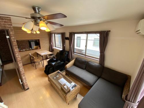 an overhead view of a living room with a couch at Hotel EL Shinjuku 1 free parking in Tokyo