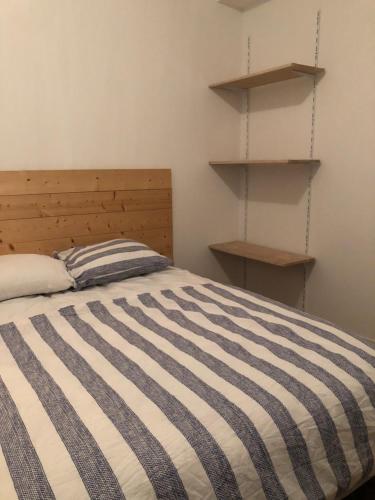 Postel nebo postele na pokoji v ubytování Les berges de l’Isle