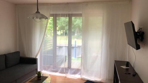 TV a/nebo společenská místnost v ubytování Ferienwohnung 2 - Gourmetzimmer