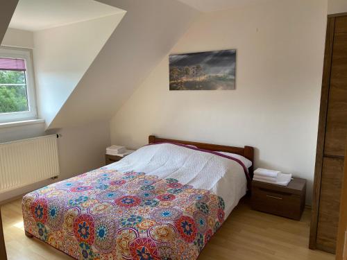 Ένα ή περισσότερα κρεβάτια σε δωμάτιο στο Panorama Lipno Rosie 2