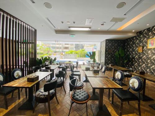 En restaurant eller et andet spisested på Taichung EnrichLife Hotel