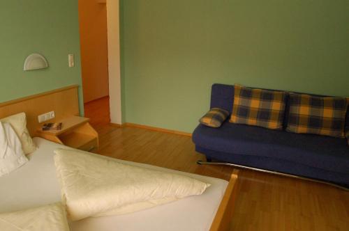 Ein Bett oder Betten in einem Zimmer der Unterkunft Siegele Irmgard