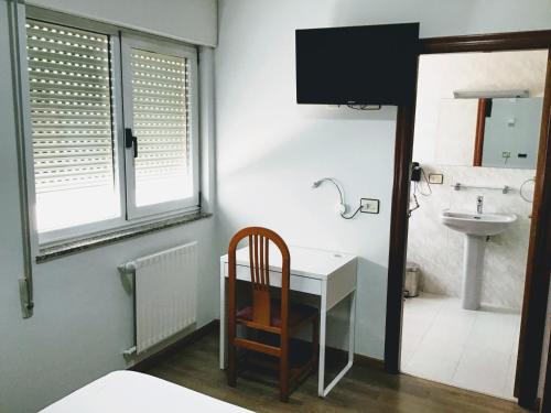 Posteľ alebo postele v izbe v ubytovaní Hotel Los Olmos