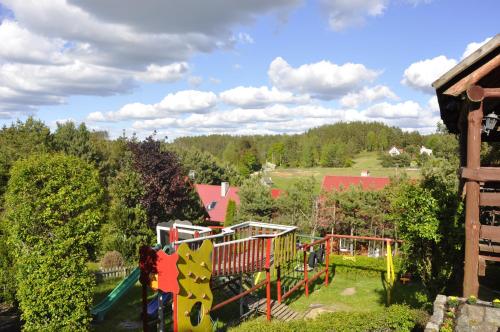 Taman di luar Domki Baryła z Sauna i Basenem