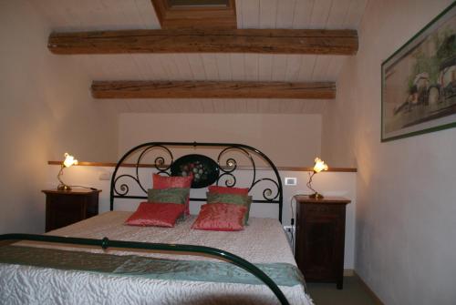 Postel nebo postele na pokoji v ubytování Agriturismo Vellaneta
