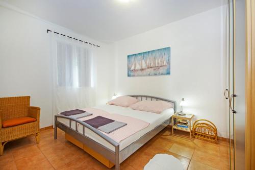 Katil atau katil-katil dalam bilik di Apartments Silva