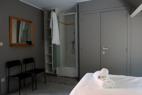 Postel nebo postele na pokoji v ubytování Pelagie