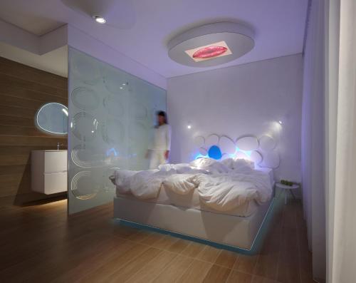 Krevet ili kreveti u jedinici u okviru objekta Marina Verde Resort Official