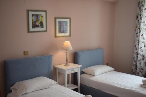 Postel nebo postele na pokoji v ubytování Eleonora apartment no2