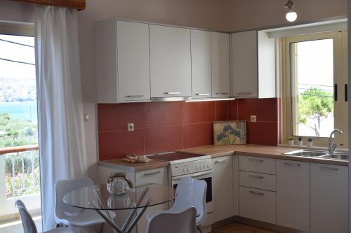 Η κουζίνα ή μικρή κουζίνα στο Eleonora apartment no2
