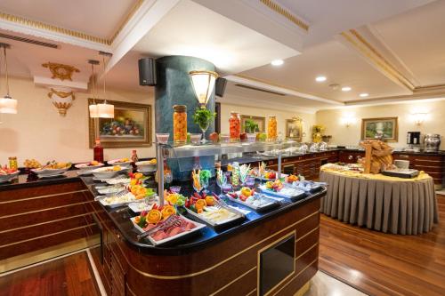 a buffet line in a hotel with food at Ilci Residence Hotel in Ankara