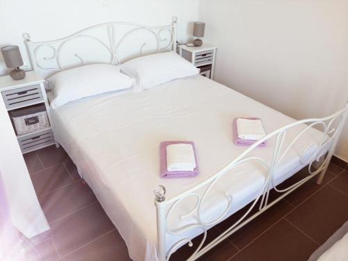 Katil atau katil-katil dalam bilik di Apartmani Skalinada