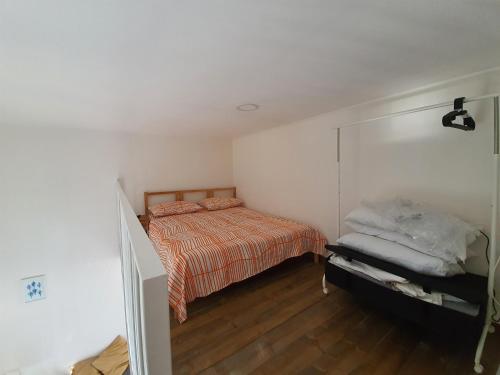 Ένα ή περισσότερα κρεβάτια σε δωμάτιο στο L & F Apartment's