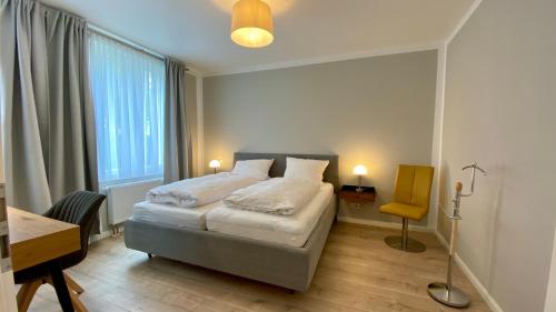 Ένα ή περισσότερα κρεβάτια σε δωμάτιο στο YourHomeWismar