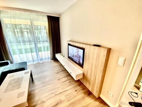 En TV eller et underholdningssystem på Prywatne Apartamenty w Bel Mare Międzyzdroje Parking GRATIS