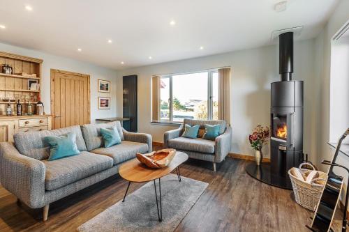 Zona de estar de Skye Lodge Dunvegan Skye
