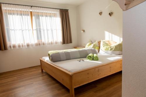 Ferienwohnung Lech'tl tesisinde bir odada yatak veya yataklar