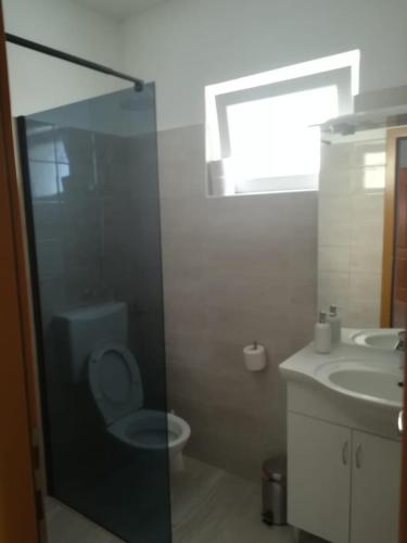 Kúpeľňa v ubytovaní Plava laguna Miroslav