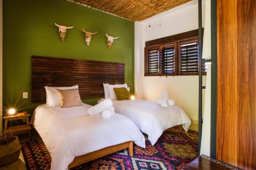 Cama ou camas em um quarto em Selina Sayulita