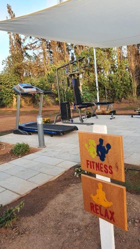 a sign in front of a park with a playground at Azienda Agricola I Peperoncini in Alghero