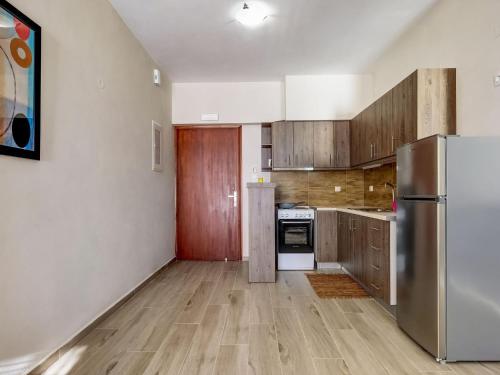 Η κουζίνα ή μικρή κουζίνα στο Studio in Ravdoucha with Sea View Balcony