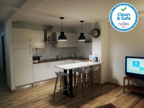 Kuchyň nebo kuchyňský kout v ubytování Casa da Corisca