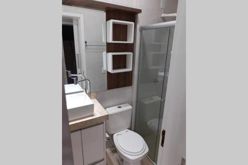 Ванная комната в Apartamento Térreo com Jardim e Garagem