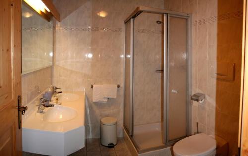 Koupelna v ubytování Hotel Piné