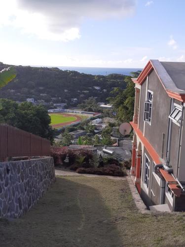 a view of the ocean from a house at Résidence Véronia in Rodrigues Island