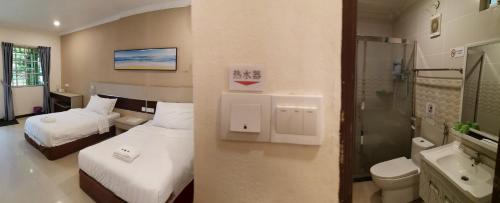 Vonios kambarys apgyvendinimo įstaigoje Hemingway Cottage 海明威度假屋