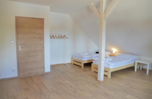 Postel nebo postele na pokoji v ubytování Resort Erich