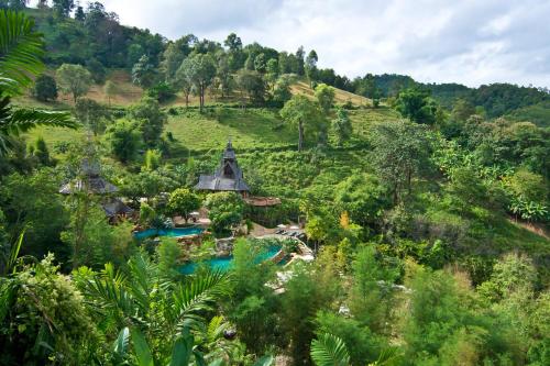 an aerial view of a resort in the jungle at Panviman Chiang Mai Spa Resort in Mae Rim